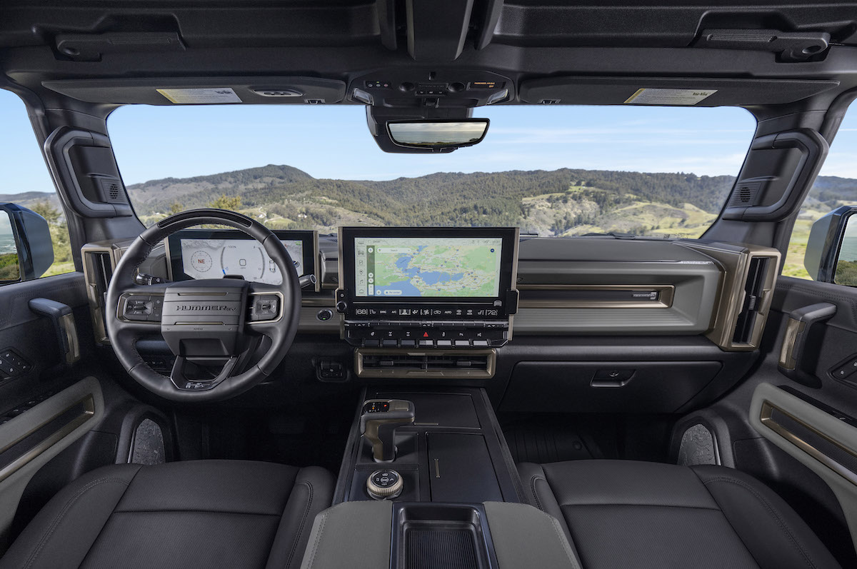 Hummer EV interior with massive screen and mountain view