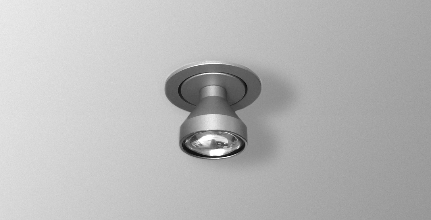 A ceiling-mounted fiber optic light fixture
