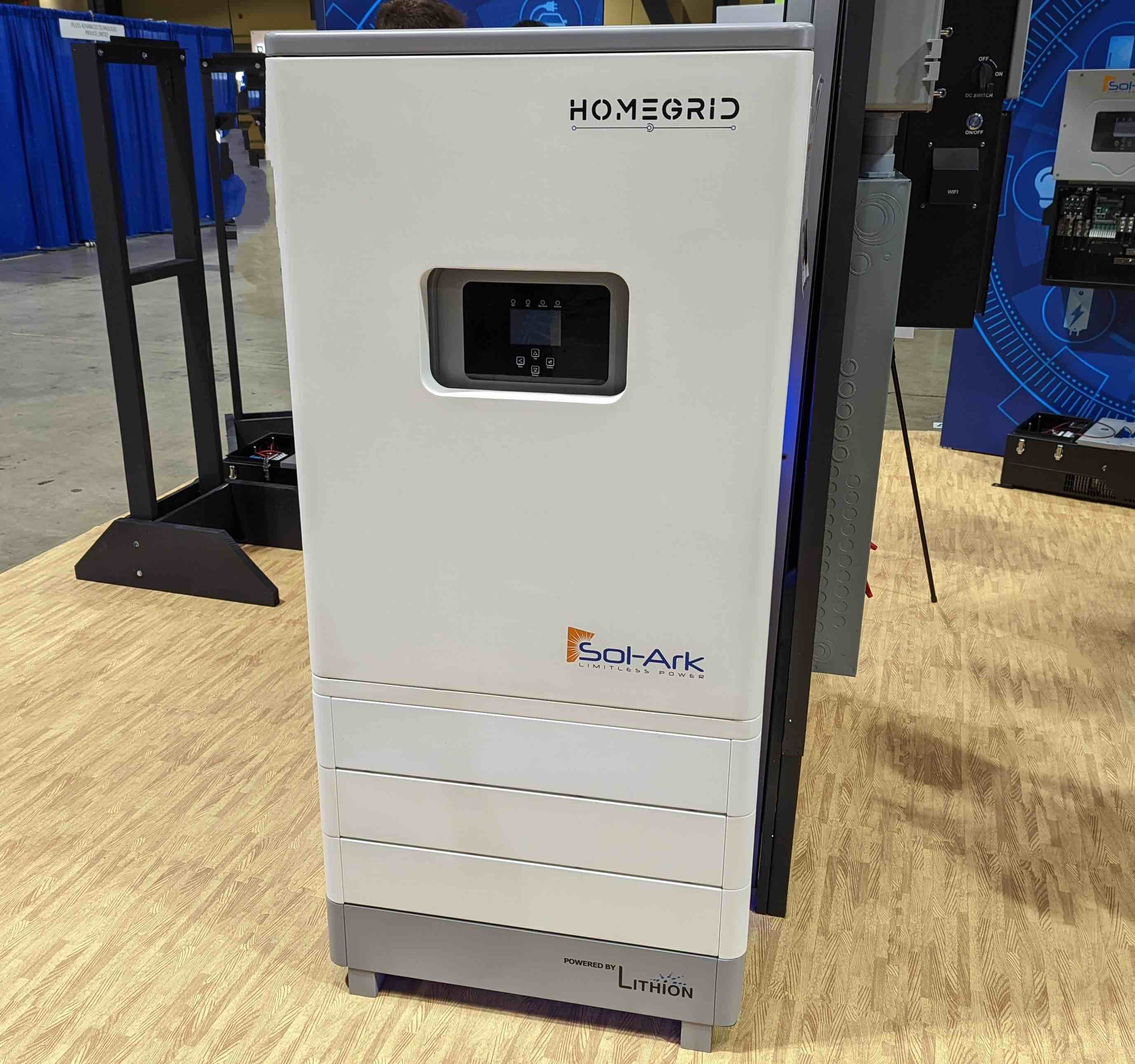 A photo of a HomeGrid Integrated series battery with a Sol-Ark inverter in the top