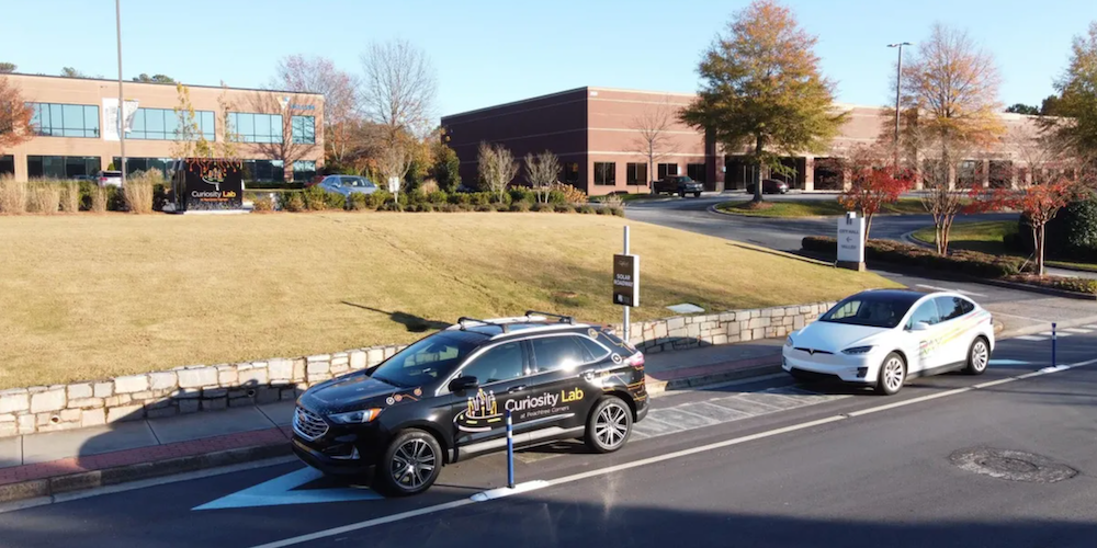 Photo of cars driving on the City of Peachtree Corners’ solar roadway